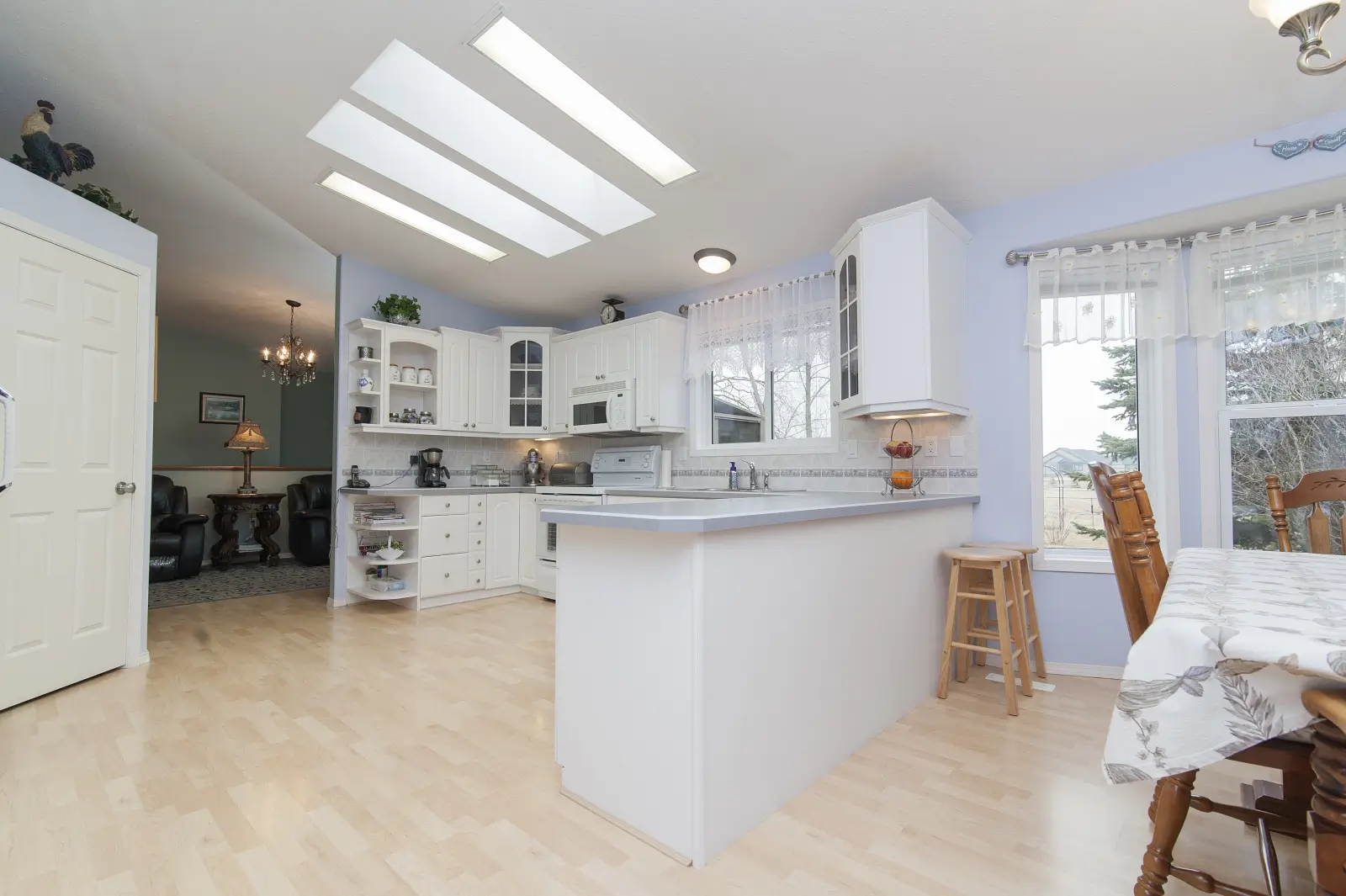 Modern open-concept kitchen with large picture window